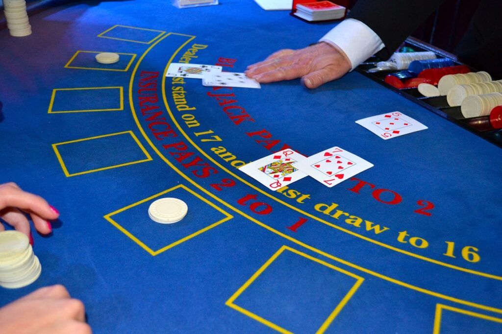 Img source: https://pixabay.com/photos/cards-dealer-black-jack-casino-bet-1437776/